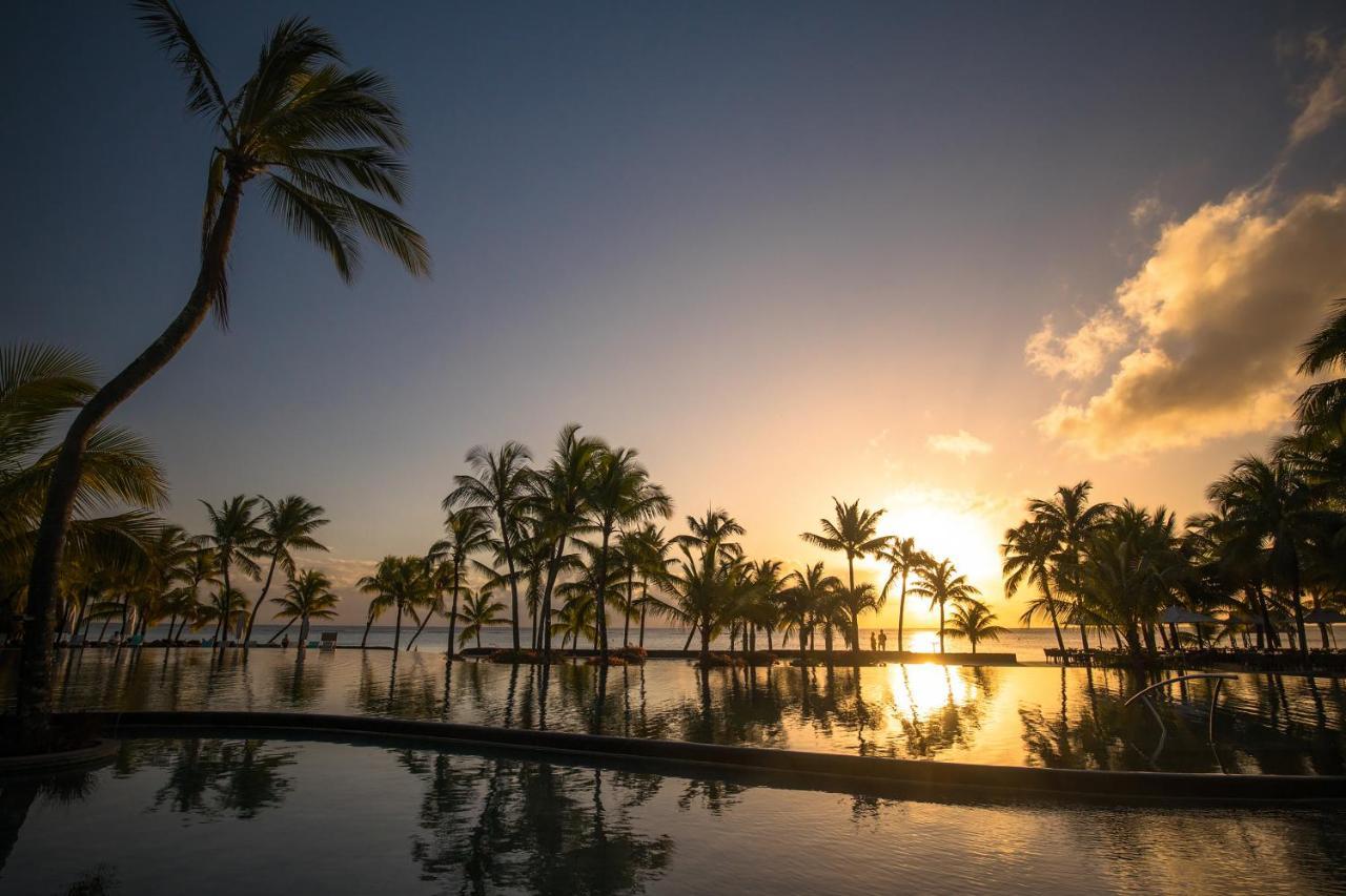 Trou Aux Biches Beachcomber Golf Resort & Spa Esterno foto Sunset at the Sheraton Waikiki
