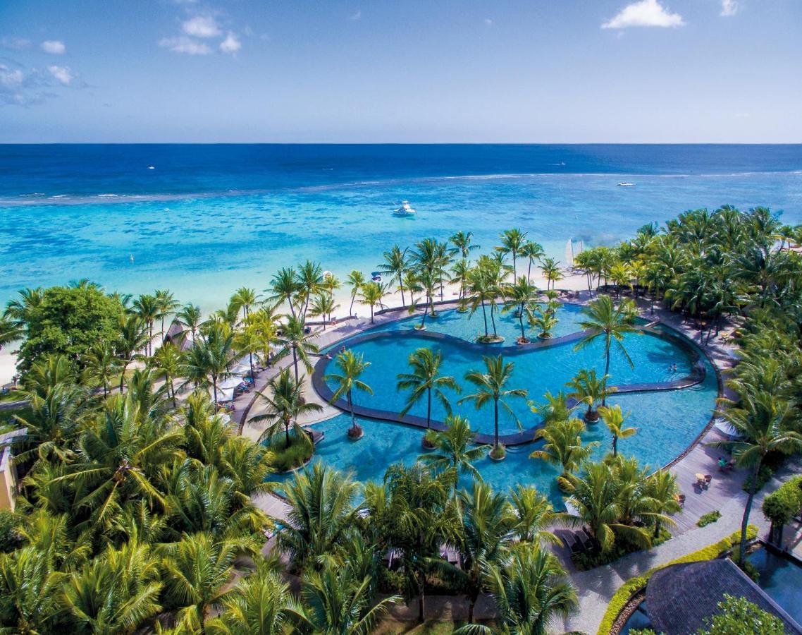 Trou Aux Biches Beachcomber Golf Resort & Spa Esterno foto Aerial view of the pool at the Hilton Maldives Iru Veli