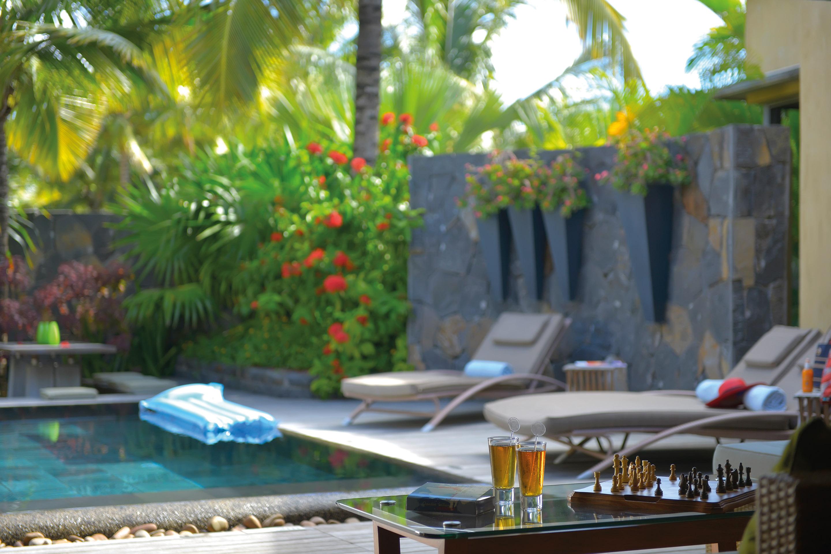 Trou Aux Biches Beachcomber Golf Resort & Spa Esterno foto A pool at the resort